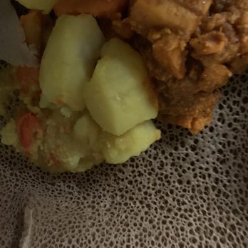 E'Njoni Cafe - Yams and potatoes with carrots. Kid size. - Ethiopian Near Me - Portland, Oregon E'Njoni Cafe - Yams and potatoes with carrots. Kid size. - Ethiopian Near Me - Portland, Oregon