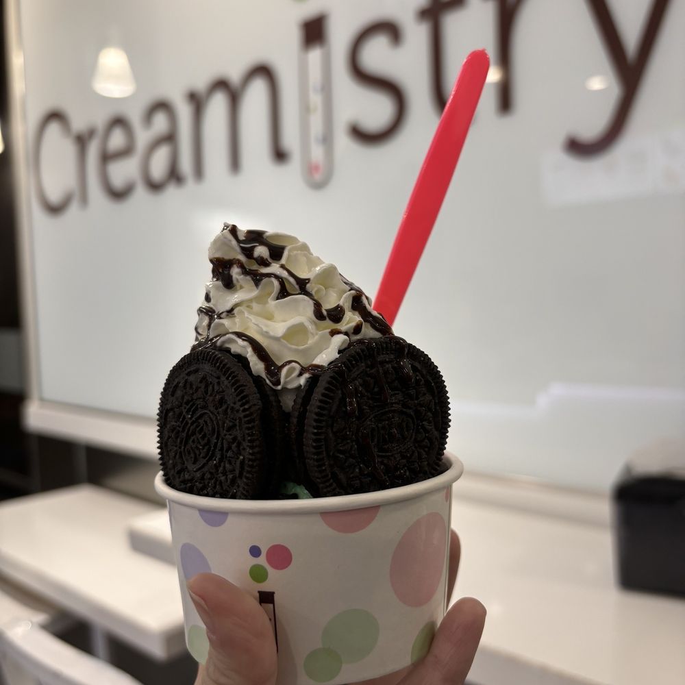 Elemint- Mint Ice Cream, Oreo® Cookies, Mini Chocolate Chips, Chocolate Fudge Drizzle, Whipped Cream Elemint- Mint Ice Cream, Oreo® Cookies, Mini Chocolate Chips, Chocolate Fudge Drizzle, Whipped Cream