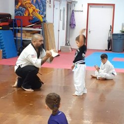 Team Dragon Martial Arts Academy - Breaking his first board