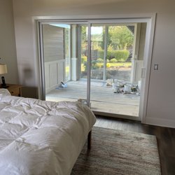 All In One Services - All in One replaced a small, dark door with a huge sliding glass door.