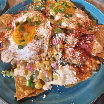 Yellow Door Taqueria - Breakfast nachos. The sunny side egg YUM! - Mexican Near Me - Boston, Massachusetts Yellow Door Taqueria - Breakfast nachos. The sunny side egg YUM! - Mexican Near Me - Boston, Massachusetts