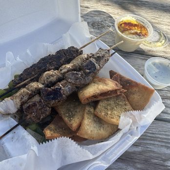 Kebabas - Delicious Steak Kebab, Kafta Kebab, pita chips with grilled onions and peppers accompanied by a side of Hummus and Tzatziki - Mediterranean Near Me - Tallahassee, Florida Kebabas - Delicious Steak Kebab, Kafta Kebab, pita chips with grilled onions and peppers accompanied by a side of Hummus and Tzatziki - Mediterranean Near Me - Tallahassee, Florida