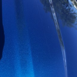 7 inch scratch on my hood clearly from the washing pads dragging over my car 7 inch scratch on my hood clearly from the washing pads dragging over my car