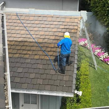 Pro Form Window Cleaning - Washing the moss and discoloration from the roofing tiles. - Window Washing Near Me - Santa Ana, California Pro Form Window Cleaning - Washing the moss and discoloration from the roofing tiles. - Window Washing Near Me - Santa Ana, California