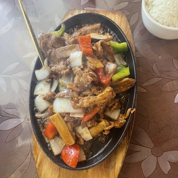 Shan China Bistro and Bar - Shan Sizzling Hot Plate Beef with Black Pepper - Chinese Near Me - Austin, Texas Shan China Bistro and Bar - Shan Sizzling Hot Plate Beef with Black Pepper - Chinese Near Me - Austin, Texas