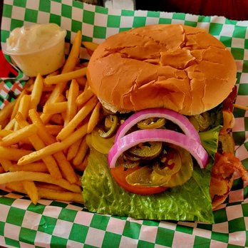 Balkan Cafe & Grill - The Balkin Cheeseburger with Bacon and Jalipena peppers added. The French Fries came with the meal. - Modern European Near Me - Austin, Texas