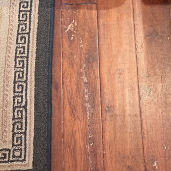 Flohr - Example of finish pealing away after 8 years. - Flooring Near Me - Austin, Texas