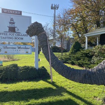 Coffee Pot Cellars - an elephant statue in front of a sign - Wineries Near Me - Cutchogue, New York