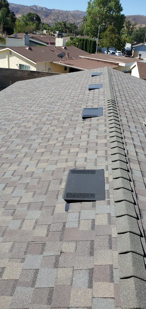 Slide of Three Clovers Roofing