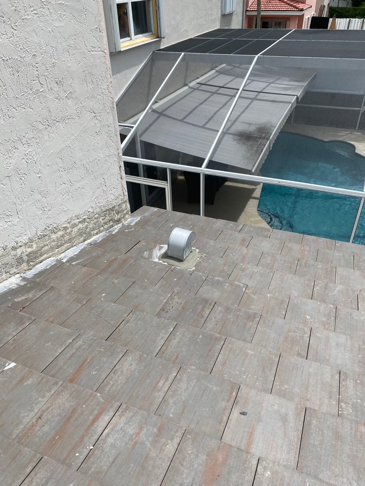 Slide of RCI Roofing