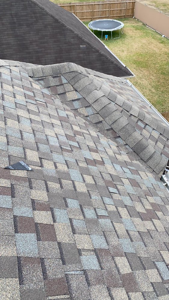 Slide of Top Shield Roofing