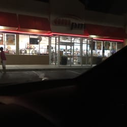 Arco Ampm - Glass foyer built to guard against gusty winds