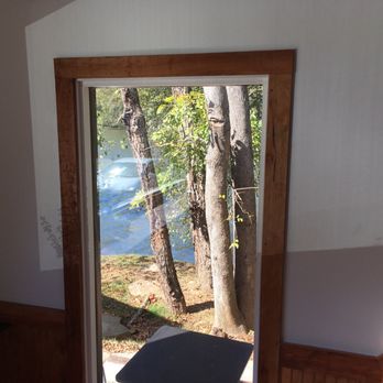 High Five Coffee - Riverside - Another, two-person table just outside a window. - Coffee & Tea Near Me - Woodfin, North Carolina