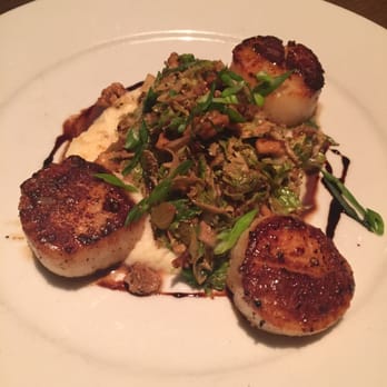 Betty - Seared scallops with celery root purée and crispy brussel sprouts - New American Near Me - Seattle, Washington Betty - Seared scallops with celery root purée and crispy brussel sprouts - New American Near Me - Seattle, Washington