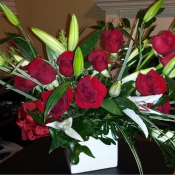 Flower Fiesta - Red roses & white stargazer lilies with lily grass. - Florists Near Me Flower Fiesta - Red roses & white stargazer lilies with lily grass. - Florists Near Me