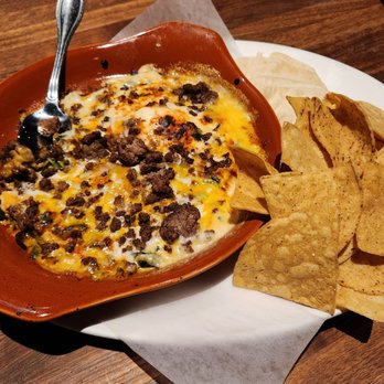 Yard House - Miguel's Queso Dip with Seasoned Ground Beef - Bars Near Me - Temecula, California Yard House - Miguel's Queso Dip with Seasoned Ground Beef - Bars Near Me - Temecula, California