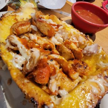 Iguana's Mexican Restaurant - Shrimp, scallops, tilapia, and crab topped with cheese, served with a plate of rice and black beans $16.99 - Mexican Near Me - Brownsburg, Indiana Iguana's Mexican Restaurant - Shrimp, scallops, tilapia, and crab topped with cheese, served with a plate of rice and black beans $16.99 - Mexican Near Me - Brownsburg, Indiana