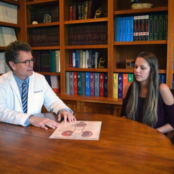 Stephen Holst - Dr. Holst interacting with a patient in the clinic. - Urologists Near Me - Sheridan, Wyoming Stephen Holst - Dr. Holst interacting with a patient in the clinic. - Urologists Near Me - Sheridan, Wyoming