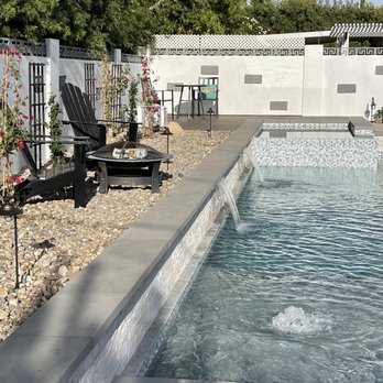 NuVision Pools - Pool and retaining wall (raised bond beam) with waterfalls - Pool & Hot Tub Service Near Me - Westlake Village, California NuVision Pools - Pool and retaining wall (raised bond beam) with waterfalls - Pool & Hot Tub Service Near Me - Westlake Village, California