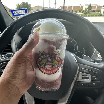 Jeremiah's Italian Ice - a hand holding a cup of ice cream - Ice Cream & Frozen Yogurt Near Me - Richmond, Texas Jeremiah's Italian Ice - a hand holding a cup of ice cream - Ice Cream & Frozen Yogurt Near Me - Richmond, Texas