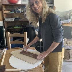 Tova’s Pottery Party - Rolling out clay