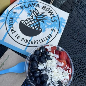 Playa Bowls - Pura Vida Acai Bowl with Cocoa flakes and almond butter added - Juice Bars & Smoothies Near Me - New York, New York Playa Bowls - Pura Vida Acai Bowl with Cocoa flakes and almond butter added - Juice Bars & Smoothies Near Me - New York, New York