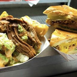 Loaded yucca fries and the signature Cubanh Mi Loaded yucca fries and the signature Cubanh Mi