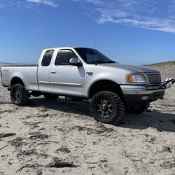 Trinity Wheel And Tire - 33 x 12.5 x 18 Nitto Extreme MT Westport, WA