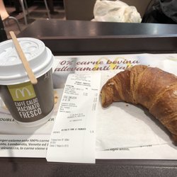 McDonald's - 2.10 euros for a coffee and pastry, not bad.