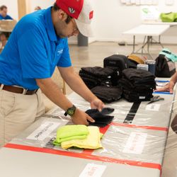 Employees folding laundry