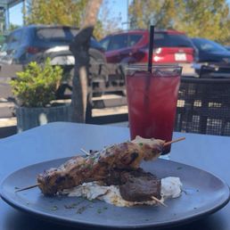 chicken and steak skewers with a yogurt herb dip, as well a blackberry green tea chicken and steak skewers with a yogurt herb dip, as well a blackberry green tea