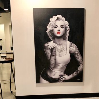 Zohra Salon - More wall art. Marilyn Monroe graces these walls. - Hair Salons Near Me - Potomac, Maryland