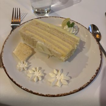 Red Fish Grill - Lemon Doberge Cake - Seafood Near Me - New Orleans, Louisiana Red Fish Grill - Lemon Doberge Cake - Seafood Near Me - New Orleans, Louisiana
