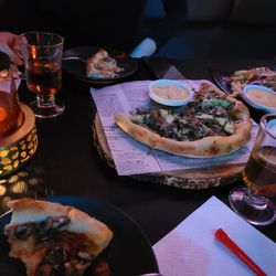 Koochini - Koochini pizza, Koochini fries, and tea