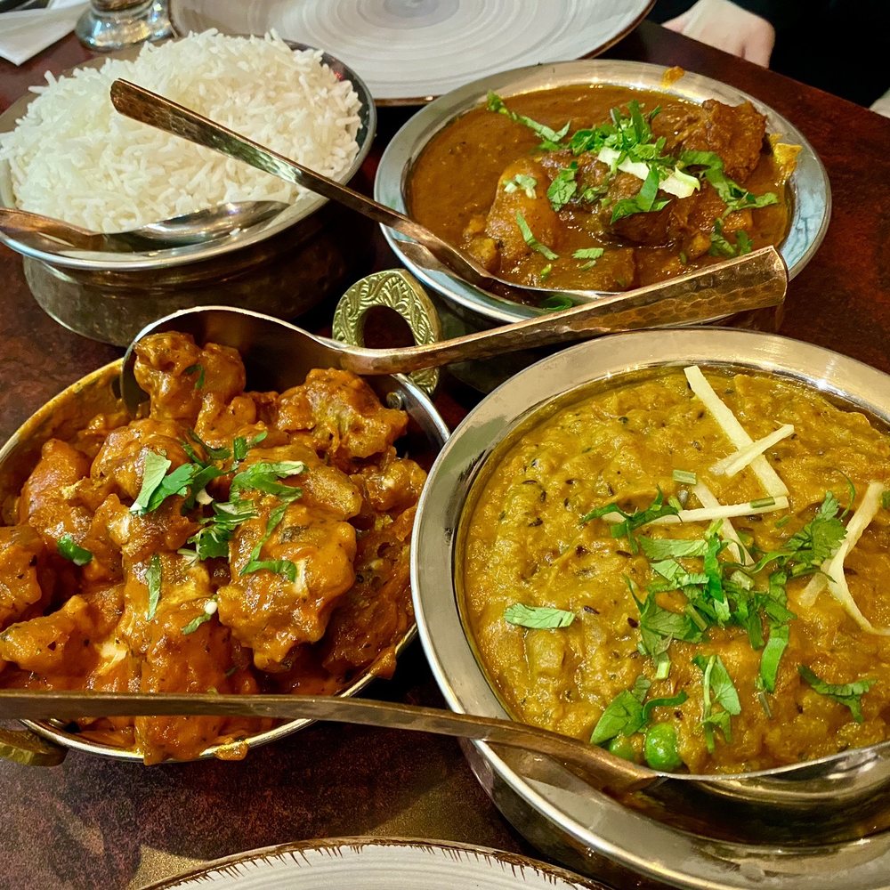 Krsma - Clockwise: rice, Lamb Vindaloo, Eggplant Bharta, Gobhi Butter Masala - Indian Near Me - Vancouver, British Columbia Krsma - Clockwise: rice, Lamb Vindaloo, Eggplant Bharta, Gobhi Butter Masala - Indian Near Me - Vancouver, British Columbia