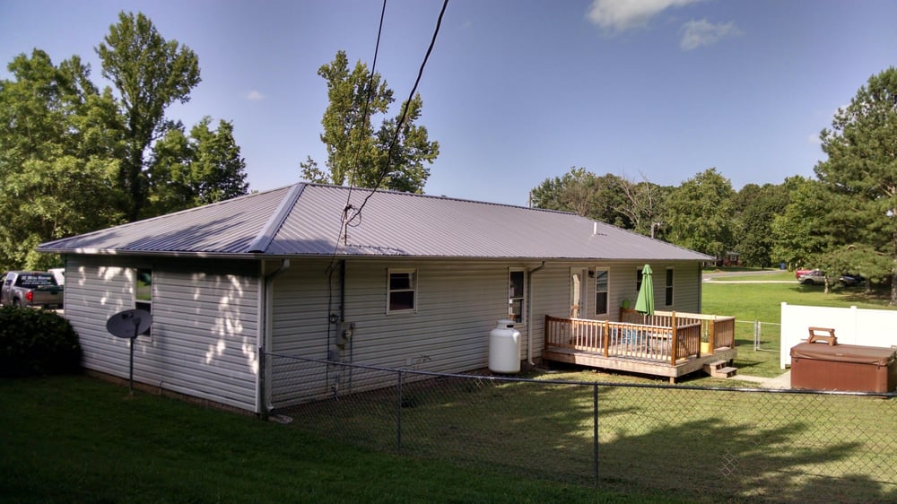 Slide of JC Metal Roofing