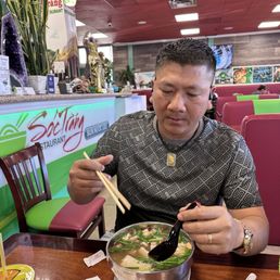My husband eating bun nuoc leo My husband eating bun nuoc leo