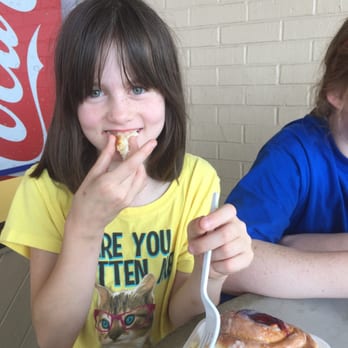 Lil' Dutch Bakery - The roll is almost the size of her head!! - Bakeries Near Me - Augusta, Georgia