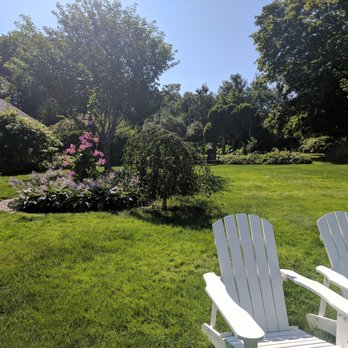 Candleberry Inn on Cape Cod - Chairs in the garden - Bed & Breakfast Near Me - Brewster, Massachusetts Candleberry Inn on Cape Cod - Chairs in the garden - Bed & Breakfast Near Me - Brewster, Massachusetts