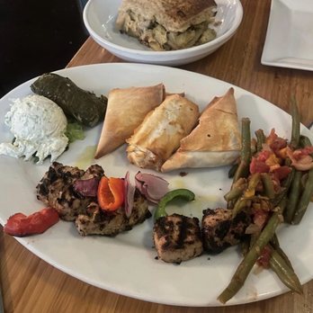 Stella's - Platter with pork souvlaki and more. - Greek Near Me - Charleston, South Carolina Stella's - Platter with pork souvlaki and more. - Greek Near Me - Charleston, South Carolina