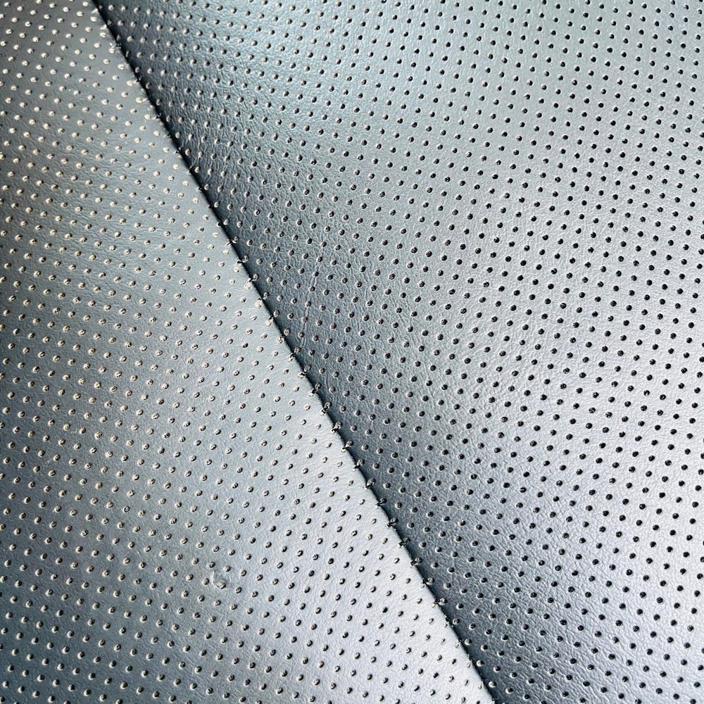 Advanced Interior Restoration Services - Before repair of front passenger seat with small hole. - Auto Upholstery Near Me - Modesto, California Advanced Interior Restoration Services - Before repair of front passenger seat with small hole. - Auto Upholstery Near Me - Modesto, California