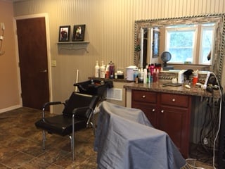 Lori's Back Yard Hair Studio Logo