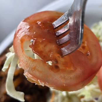 El Guajiro - A slice of tomato from the salad. - Cuban Near Me - Roanoke, Virginia El Guajiro - A slice of tomato from the salad. - Cuban Near Me - Roanoke, Virginia