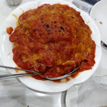 New Fusion - Baked pork chops, but it sliced pork in tomato sauce - Asian Fusion Near Me - Arcadia, California