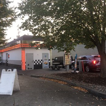 Checkers - a car parked in front of a gas station - Fast Food Near Me - Grand Rapids, Michigan