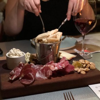 Sixty Vines - Custom made Charcuterie board with assorted cheeses, almonds, honeycomb, prosciutto, and pita bread. - Wine Bars Near Me - Winter Park, Florida Sixty Vines - Custom made Charcuterie board with assorted cheeses, almonds, honeycomb, prosciutto, and pita bread. - Wine Bars Near Me - Winter Park, Florida