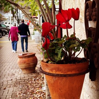 Rathskeller Bistro - people walking down a sidewalk - New American Near Me - Fredericksburg, Texas Rathskeller Bistro - people walking down a sidewalk - New American Near Me - Fredericksburg, Texas