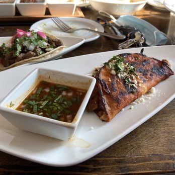 Mexcal - This is the Quesibirria with its consome. - Mexican Near Me - Reno, Nevada Mexcal - This is the Quesibirria with its consome. - Mexican Near Me - Reno, Nevada