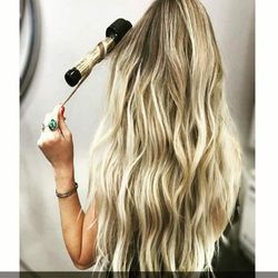 Beachy waves with hair extensions are easy. Come in and well show you how.