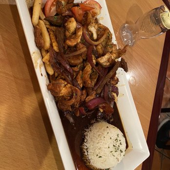 Happy Fish - Saltado mixto - Peruvian Near Me - Tampa, Florida Happy Fish - Saltado mixto - Peruvian Near Me - Tampa, Florida